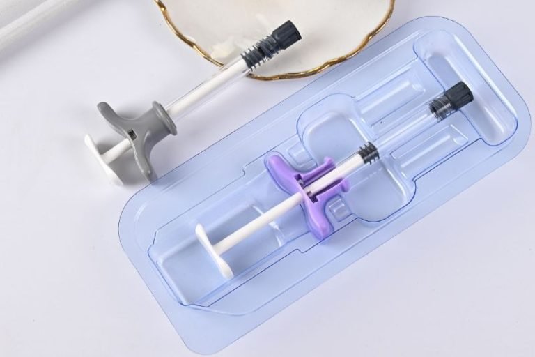 image of two polymer syringes on the table