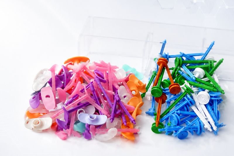 plunger rods and backstops for prefillable syringes